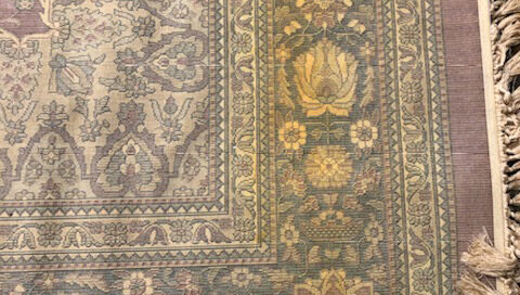 Olefin is a marginally acceptable material for rug construction